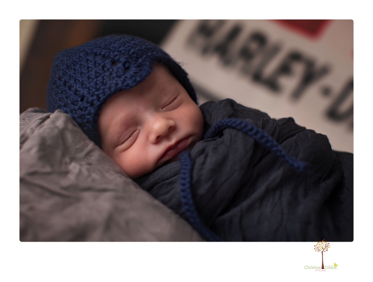 Sonora newborn photographer Christine Dibble Photography takes newborn portraits of a future Harley Davidson fan and his parents.