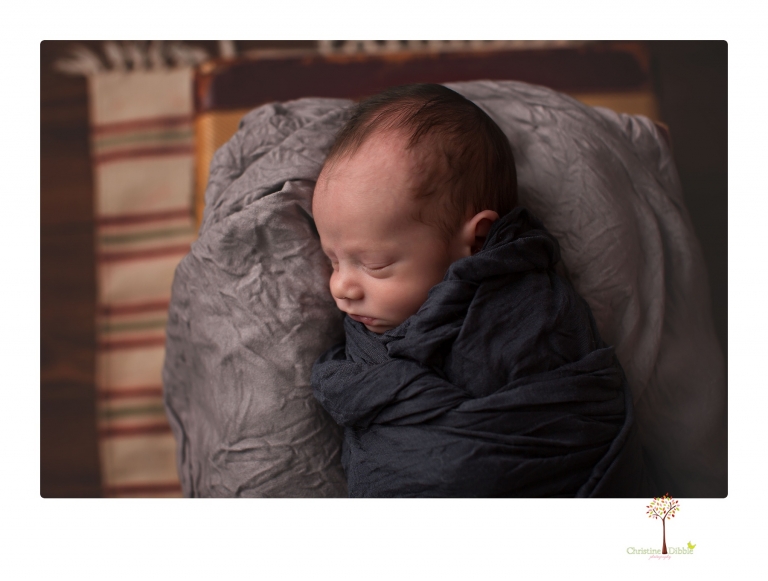 Sonora newborn photographer Christine Dibble Photography takes newborn portraits of a future Harley Davidson fan and his parents.