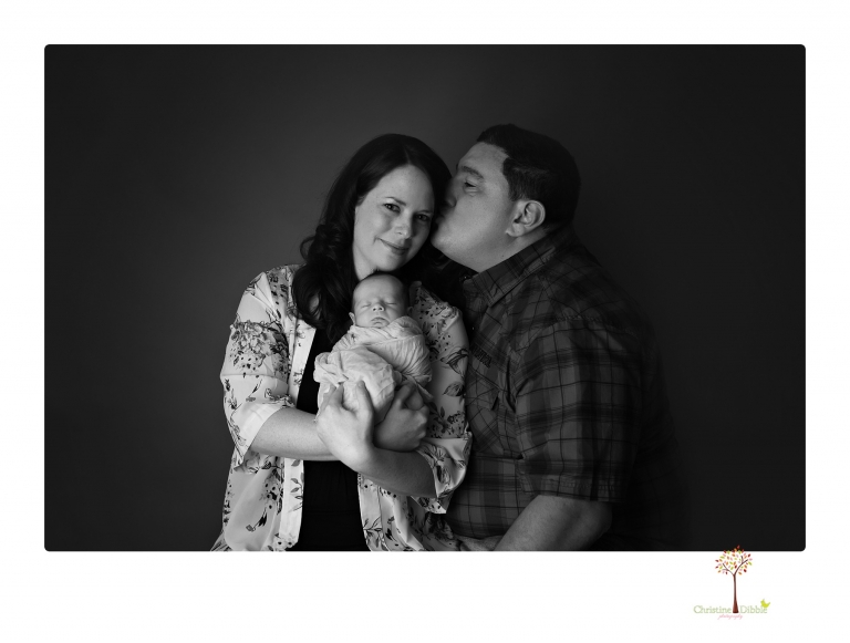 Sonora newborn photographer Christine Dibble Photography takes newborn portraits of a future Harley Davidson fan and his parents.