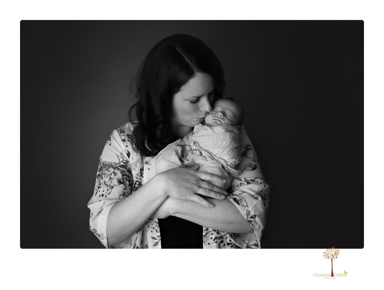 Sonora newborn photographer Christine Dibble Photography takes newborn portraits of a future Harley Davidson fan and his parents.
