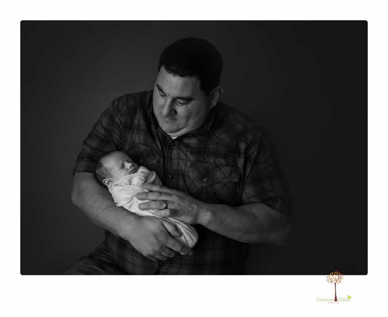 Sonora newborn photographer Christine Dibble Photography takes newborn portraits of a future Harley Davidson fan and his parents.