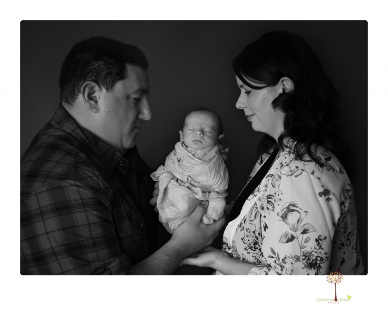 Sonora newborn photographer Christine Dibble Photography takes newborn portraits of a future Harley Davidson fan and his parents.