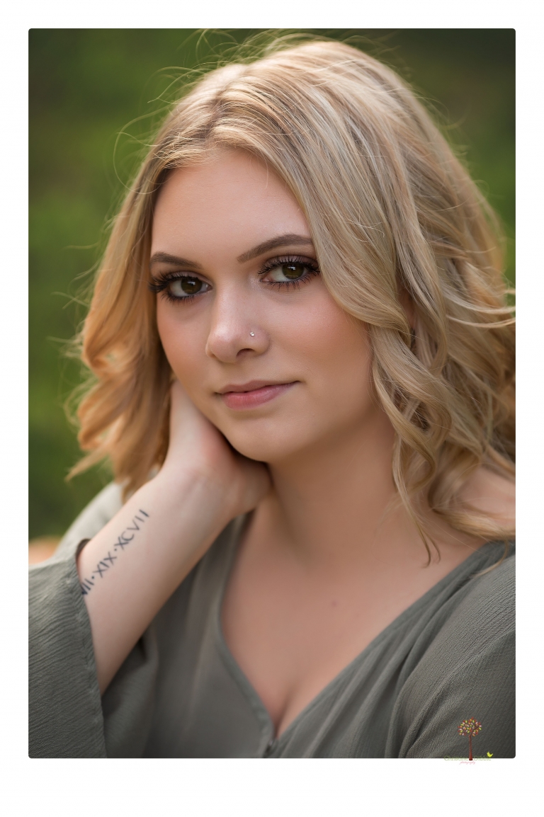 Sonora senior portrait photographer Christine Dibble Photography takes senior portraits of a Summerville High School graduate in Long Barn with her boyfriend.