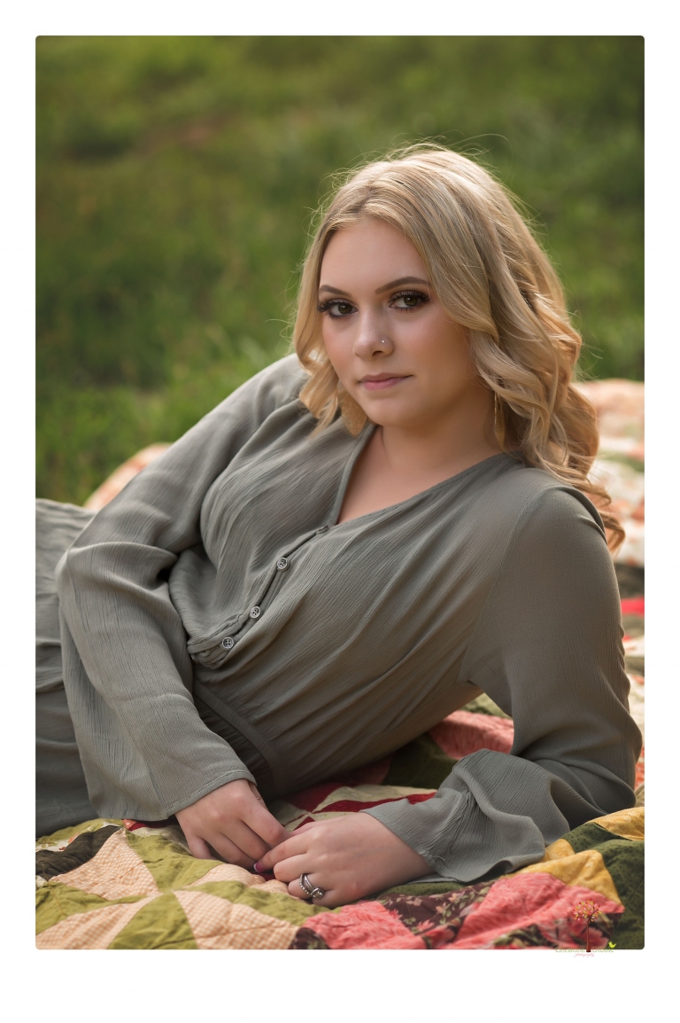 Sonora senior portrait photographer Christine Dibble Photography takes senior portraits of a Summerville High School graduate in Long Barn with her boyfriend.