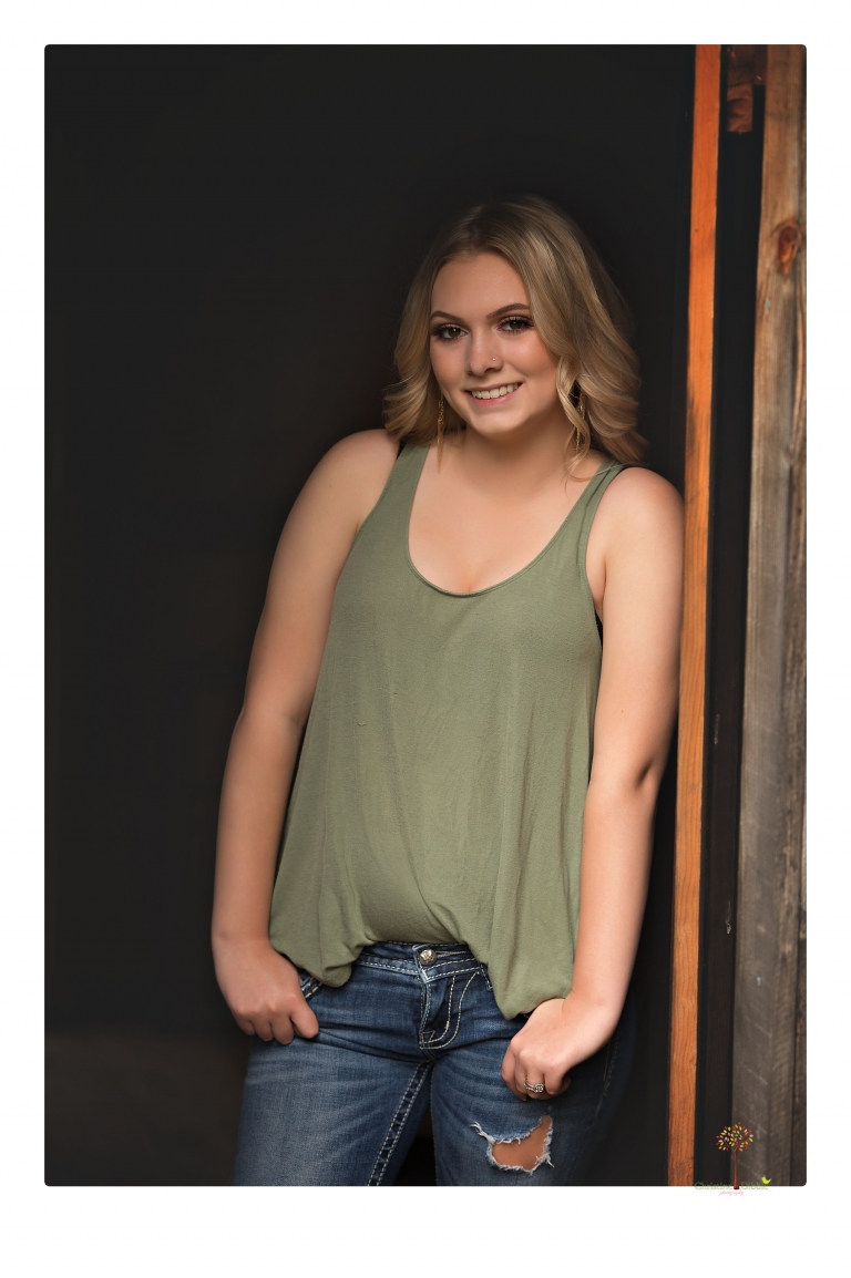 Sonora senior portrait photographer Christine Dibble Photography takes senior portraits of a Summerville High School graduate in Long Barn with her boyfriend.