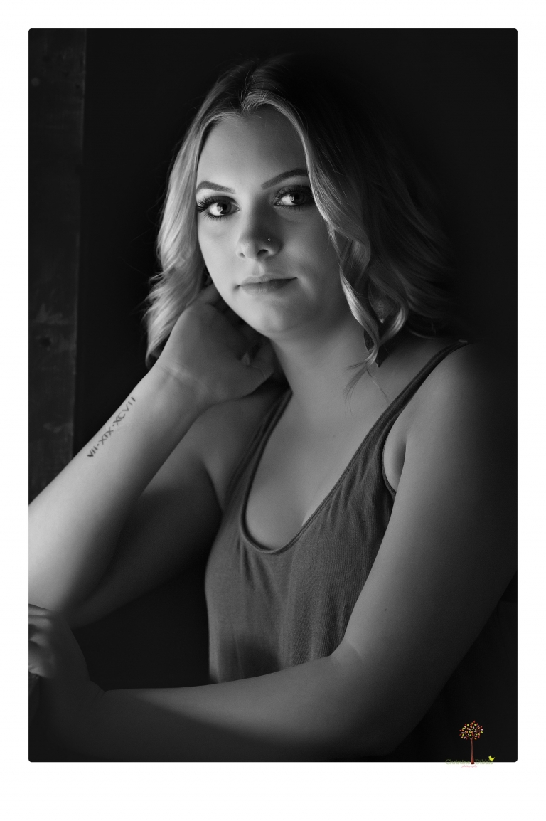 Sonora senior portrait photographer Christine Dibble Photography takes senior portraits of a Summerville High School graduate in Long Barn with her boyfriend.