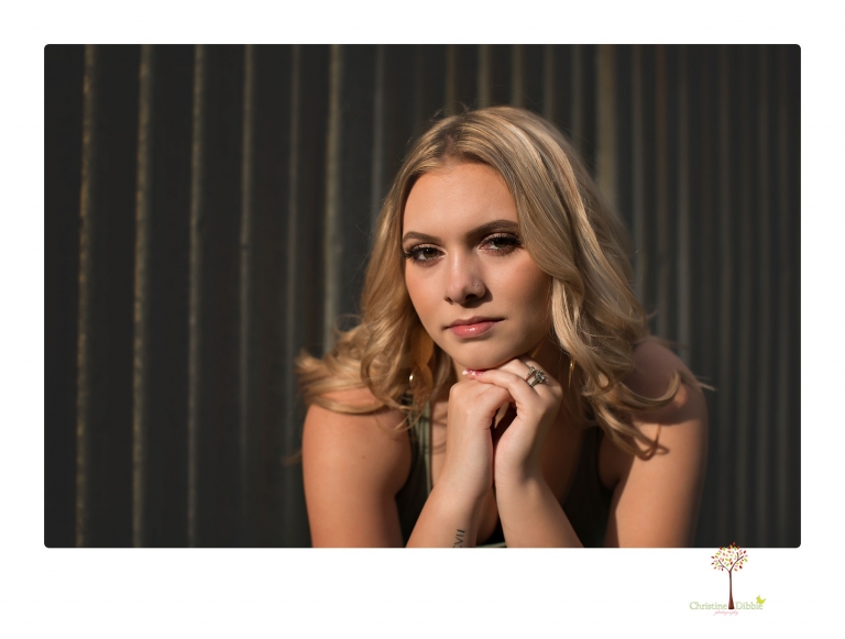 Sonora senior portrait photographer Christine Dibble Photography takes senior portraits of a Summerville High School graduate in Long Barn with her boyfriend.