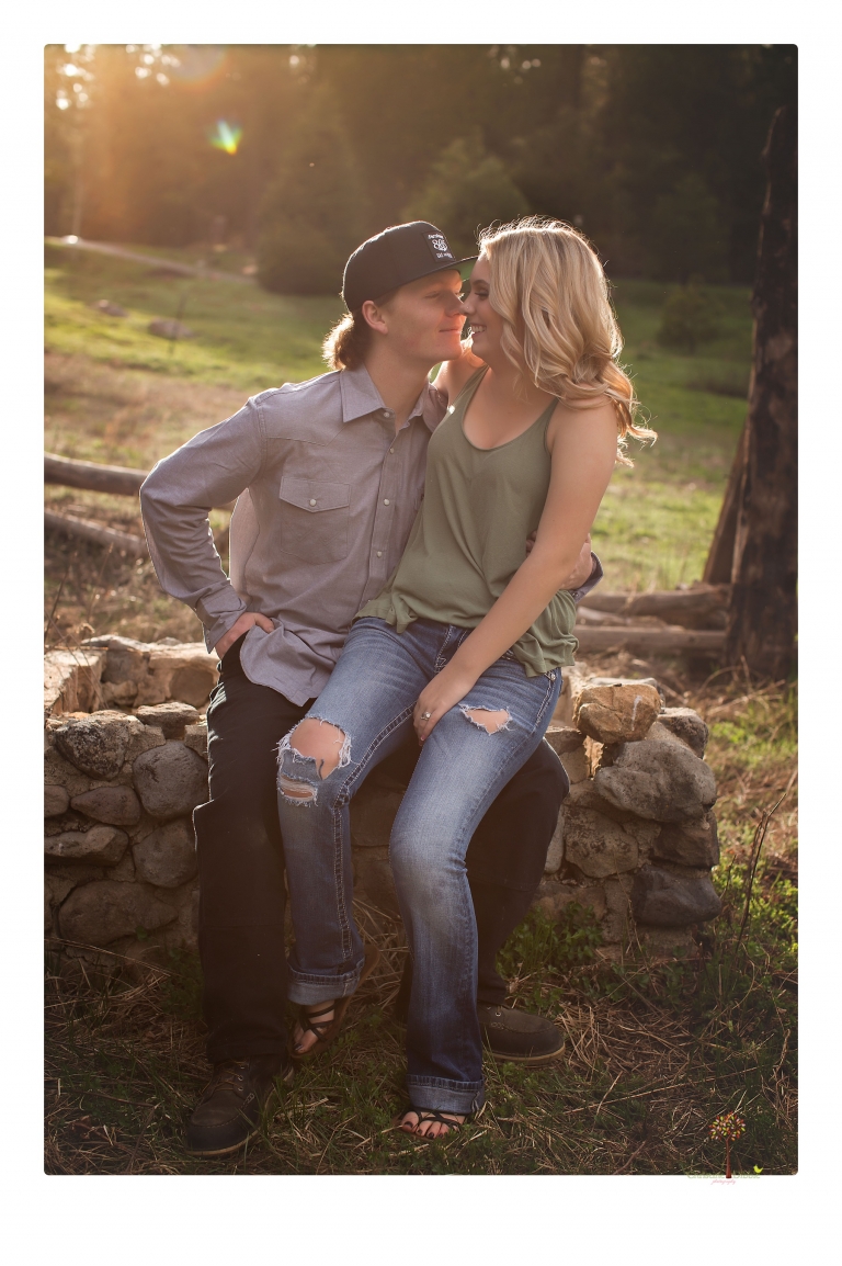 Sonora senior portrait photographer Christine Dibble Photography takes senior portraits of a Summerville High School graduate in Long Barn with her boyfriend.
