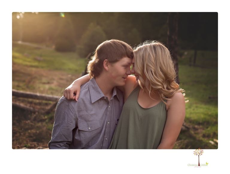 Sonora senior portrait photographer Christine Dibble Photography takes senior portraits of a Summerville High School graduate in Long Barn with her boyfriend.