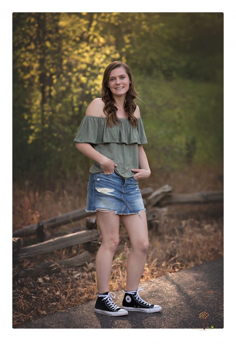 Sonora High School Senior Photographer Christine Dibble Photography photographs a senior portrait session at Indigeny Reserve of a girl among the apple trees and in the creek.