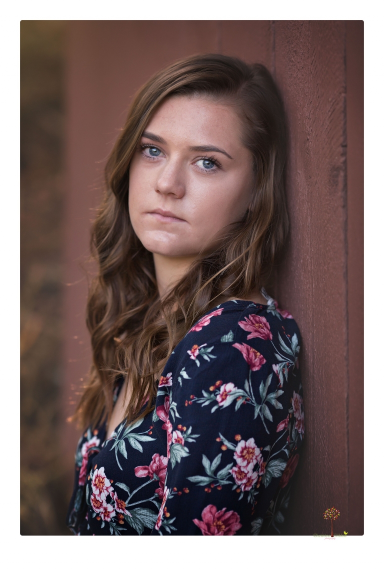 Sonora High School Senior Photographer Christine Dibble Photography photographs a senior portrait session at Indigeny Reserve of a girl among the apple trees and in the creek.