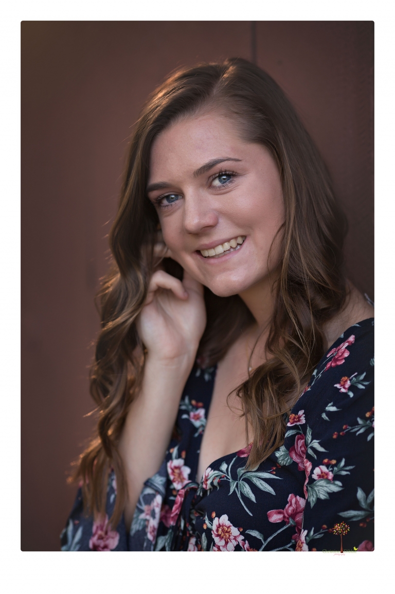 Sonora High School Senior Photographer Christine Dibble Photography photographs a senior portrait session at Indigeny Reserve of a girl among the apple trees and in the creek.