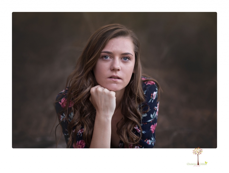 Sonora High School Senior Photographer Christine Dibble Photography photographs a senior portrait session at Indigeny Reserve of a girl among the apple trees and in the creek.