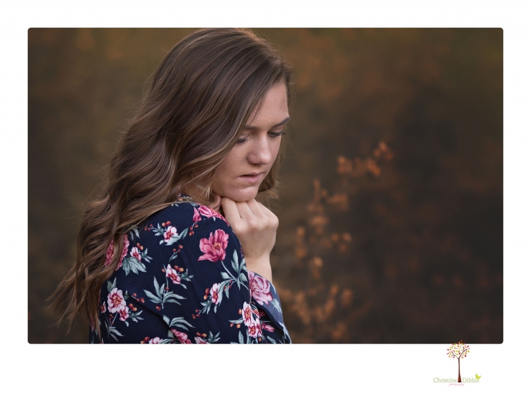 Sonora High School Senior Photographer Christine Dibble Photography photographs a senior portrait session at Indigeny Reserve of a girl among the apple trees and in the creek.