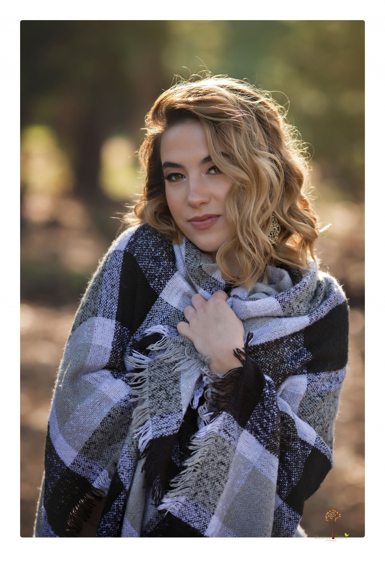 Sonora senior portrait photographer Christine Dibble Photography takes senior portraits of a fashionable senior girl in Twain Harte.