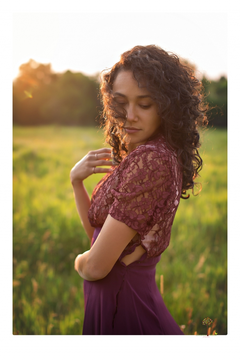 Sonora photographer Christine Dibble Photography takes portraits of a senior in Mammoth Lakes as she poses in a creek and meadow in thrift shop dresses.
