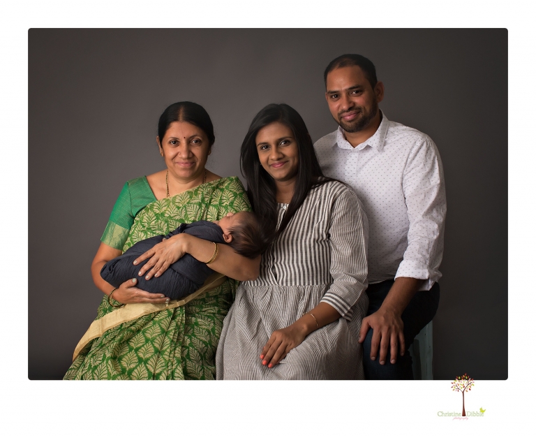 Sonora newborn photographer Christine Dibble Photography takes newborn family portraits of a baby boy and his parents and grandmother.